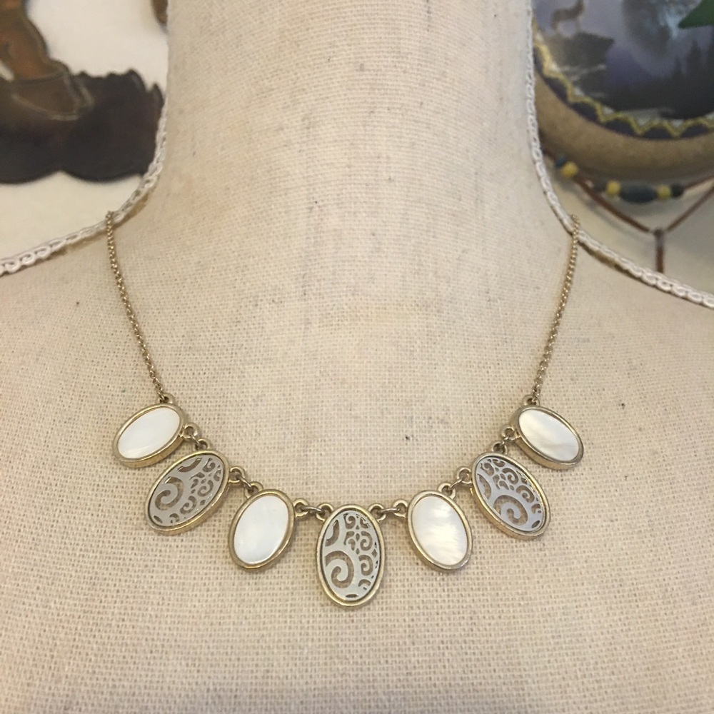 Mother of pearl and cut out filigree disc necklace